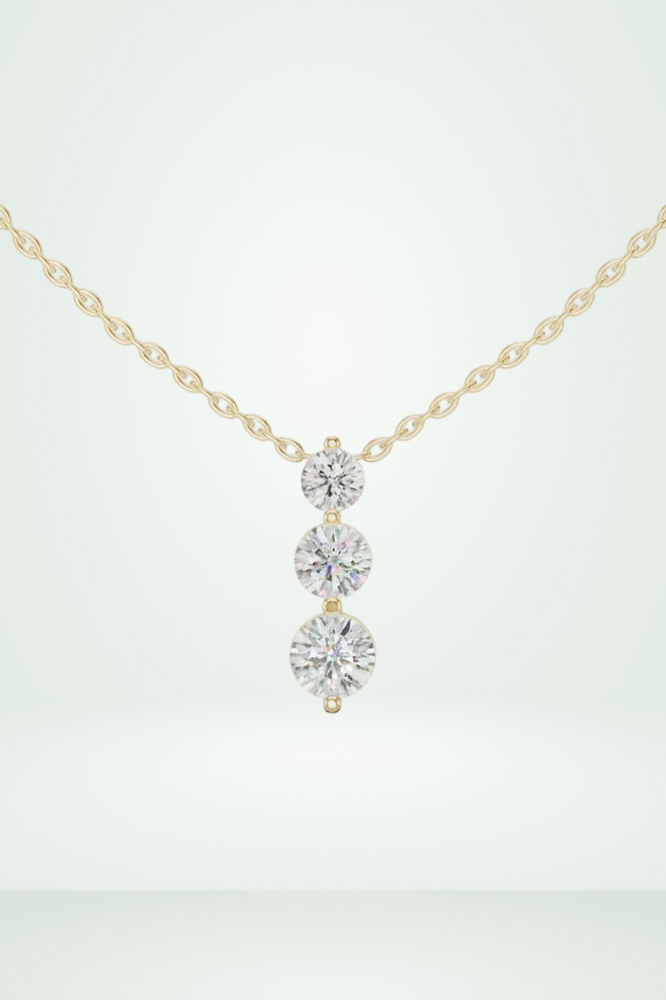 Three Stone Round Vertical Drop Necklace