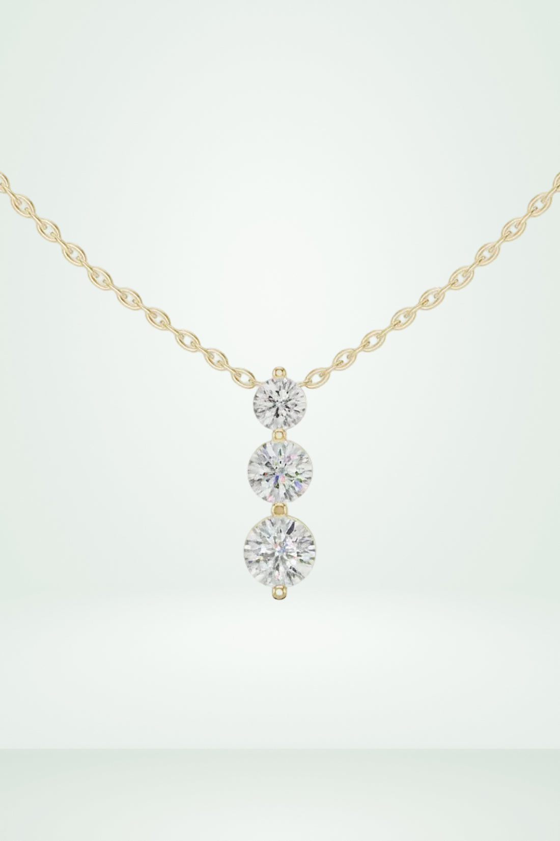 Three Stone Round Vertical Drop Necklace
